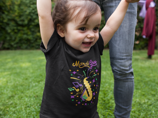 "Mardi Gras Saxophone" Toddler T-Shirt .  This Colorful Saxophone & Confetti Design Helps The Little One Get In The Carnival Mood!.